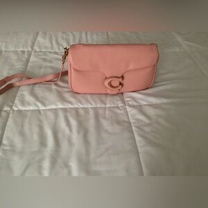 Light pink bag cute for a young girl. Never used it just was not for me.
